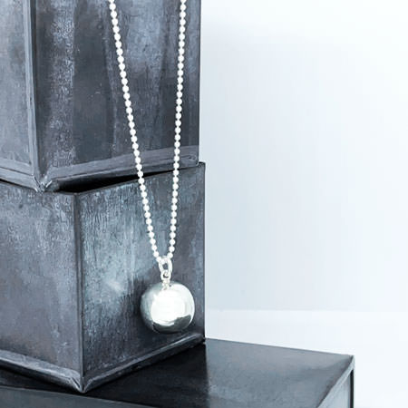 Long silver pendant necklace